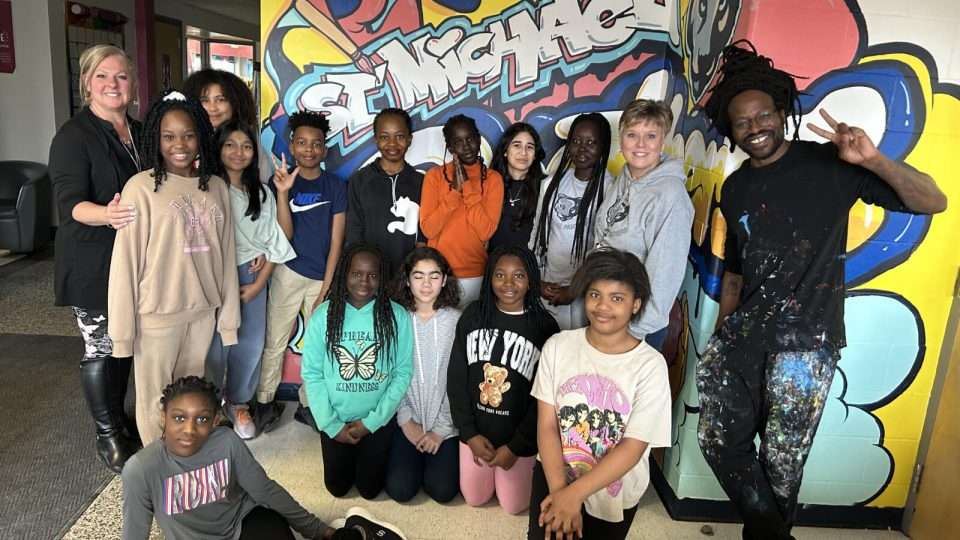 OCSB students in front of the mural