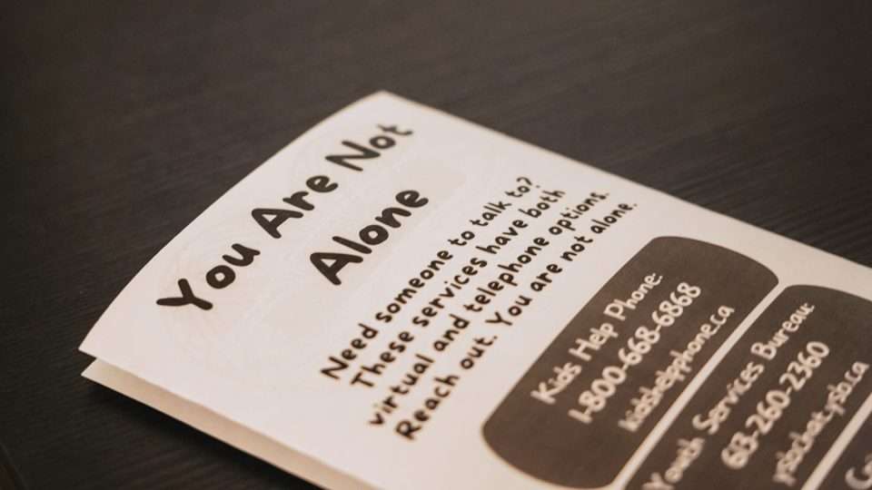 Brochure saying "You are not alone"