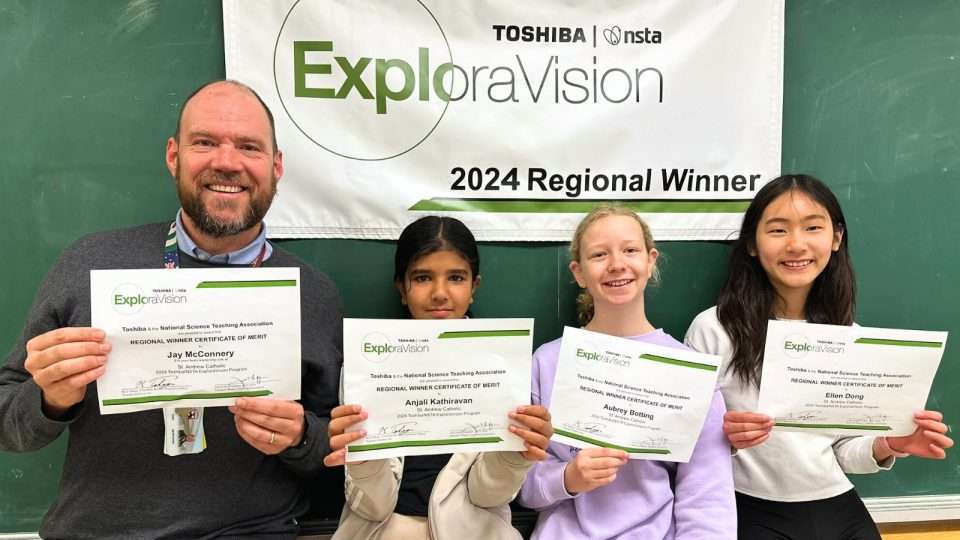 Students holding their certificates for the ExploraVision
