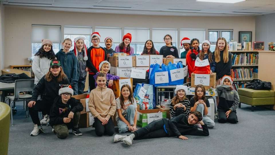 students during a donation event during Christmas season