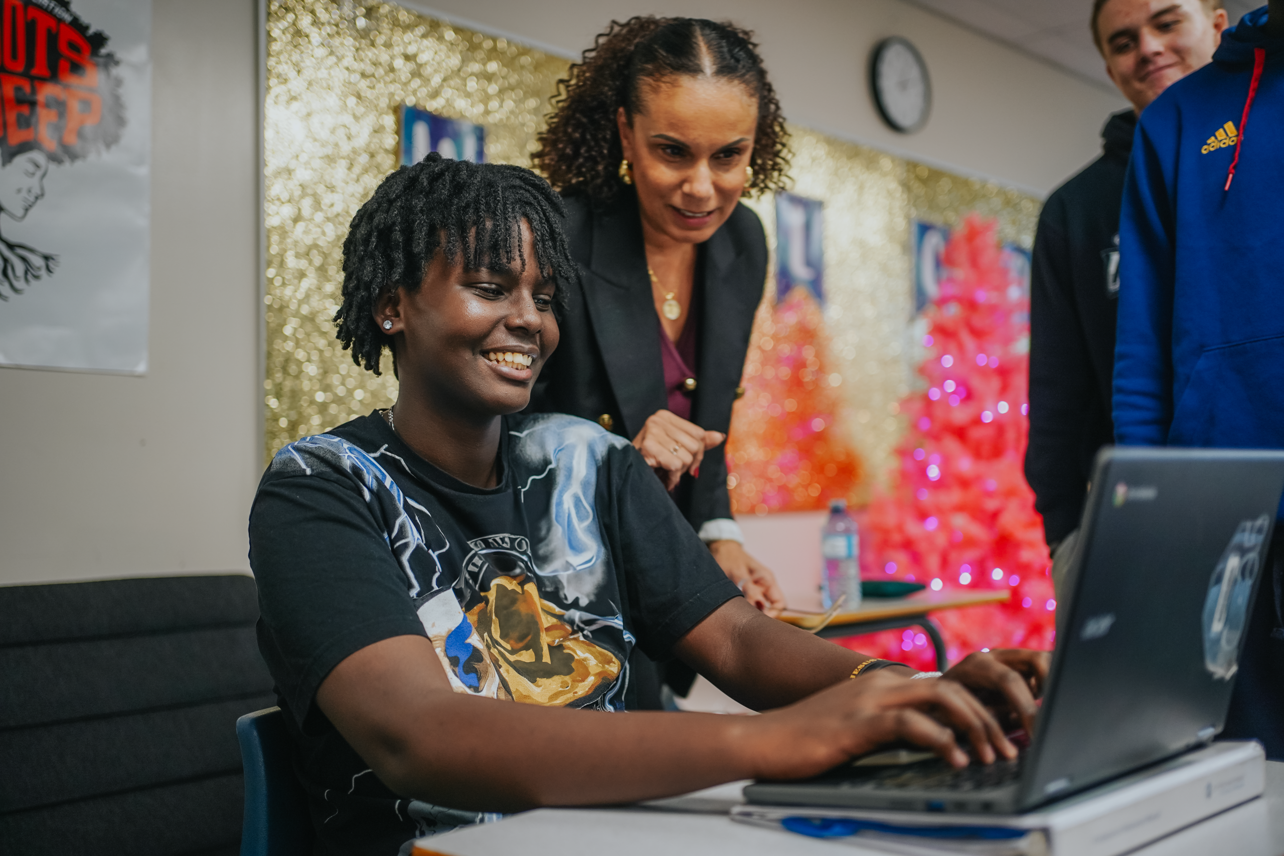 All Saints Student with her teacher