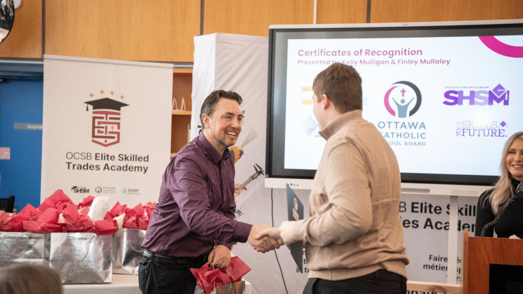 Student receiving the ESTA certificate