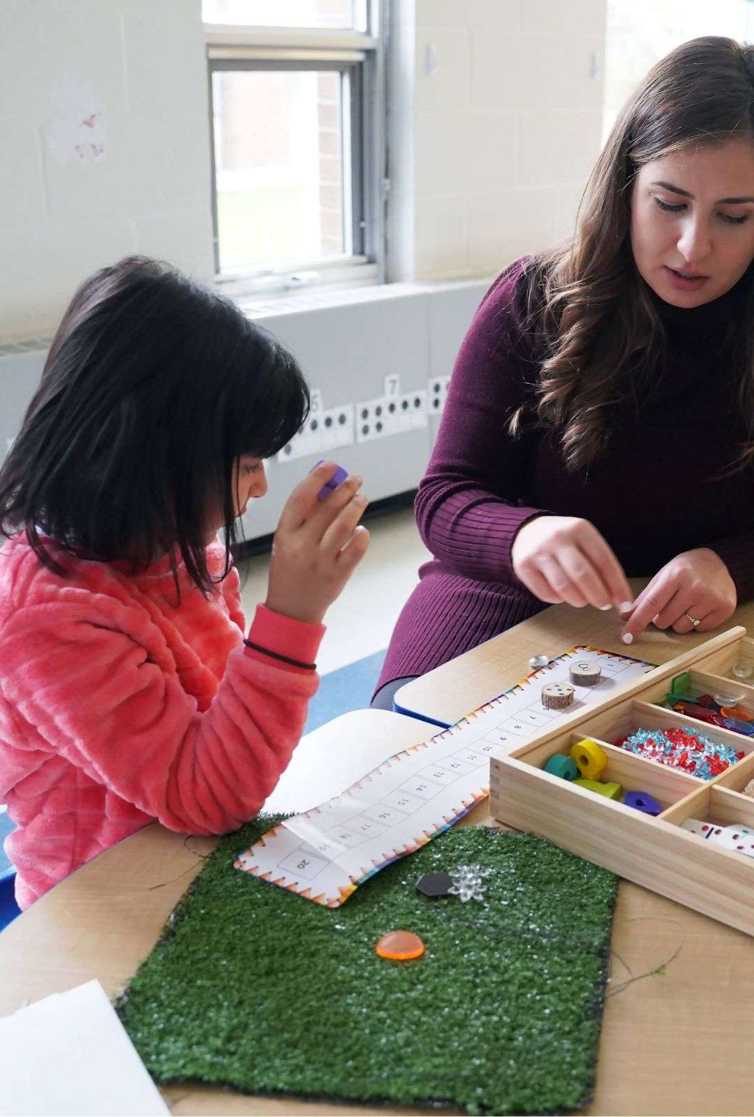 A teacher with a student at an OCSB Classroom