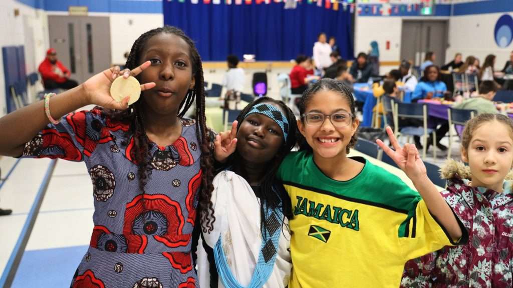 girls in the school smiling