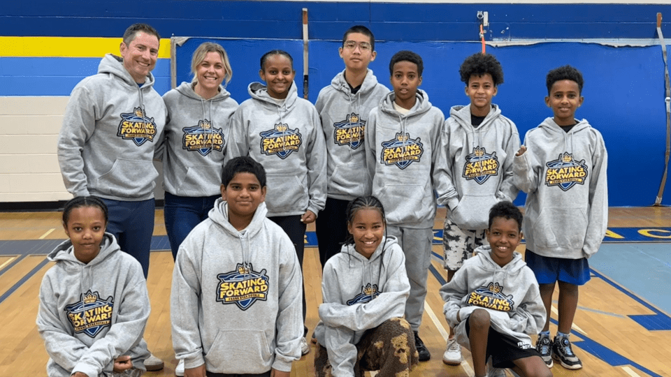 Frank Ryan instructors and students in the gym getting ready for practice