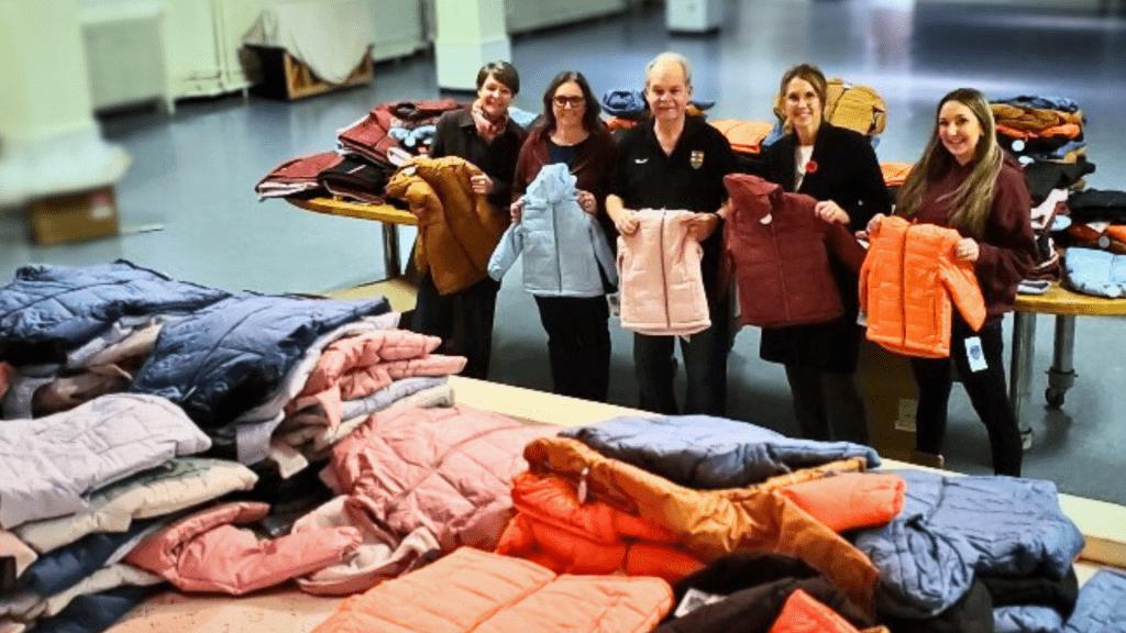 Knights of Columbus team preparing the coat donations