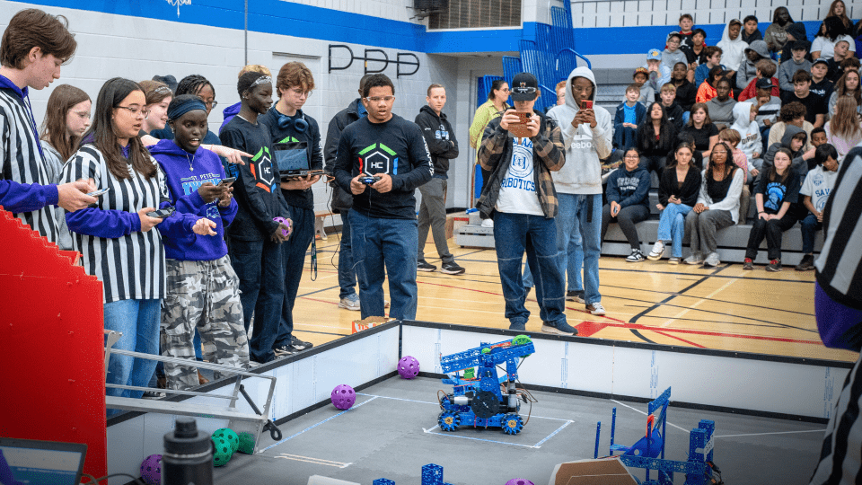 Students presenting their work during the St Peter Robotics event