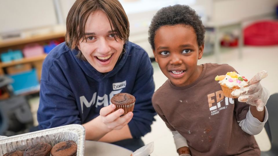 students with cupcakes